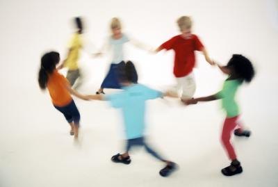 Children dancing in a circle.