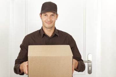 FedEx uses the postal service's extensive network of hubs for certain lower-weight packages.