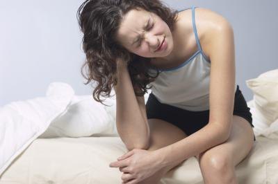 Woman waking with a headache