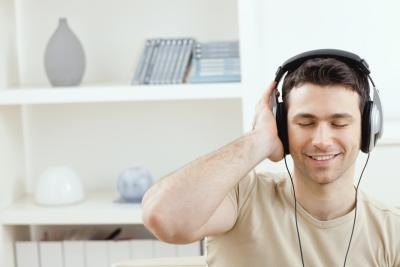 young man listening to music