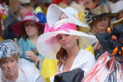 Women wearing elaborate hats at the 139th Kentucky Derby, 2013
