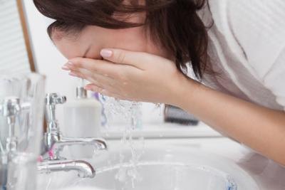 Wipe the toothpaste off in the morning.