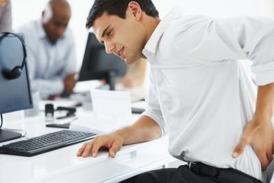 Sitting for long periods can cause the psoas tighten and pull on the lower spine.