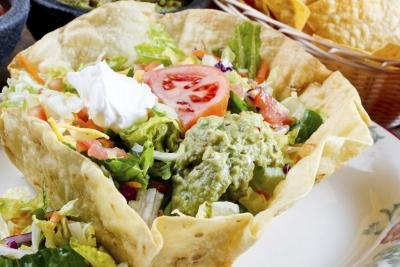 A taco salad following this recipe is a twist on the traditional taco salad.