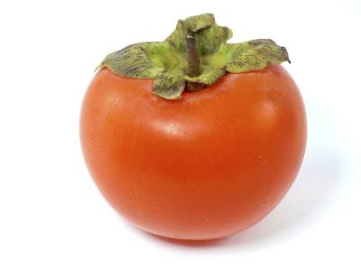 Ripe persimmon with stem.