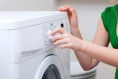 Launder clothes in hot water.
