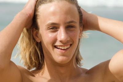 Young man with medium length hair.