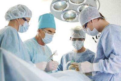 Surgeons performing surgery.