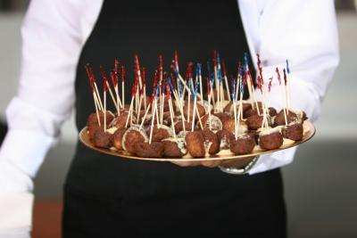 Waiter with food on tray