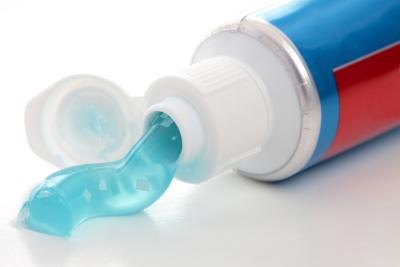 Squeeze out a small amount of toothpaste onto your finger.