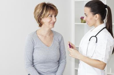 woman talking to doctor