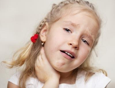 Young girl with sore throat