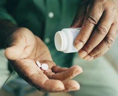 Take over the counter pain meds like advil.