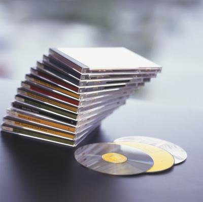 Give a CD of holiday music, a DVD of a Christmas classic movie, or a blank pack of CDs or DVDs.