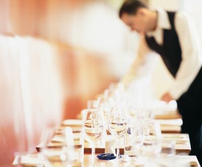Waiter setting table