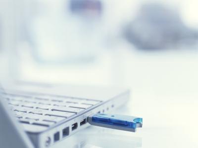 Purchase a USB key chain flash drive, a memory disk for a camera, a web cam, or a wireless optical mouse.