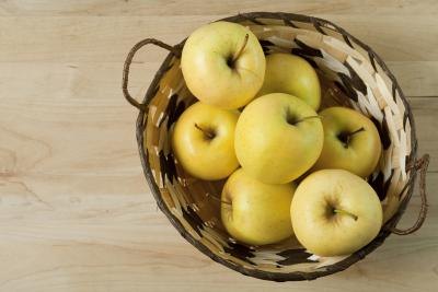 Golden Delicious apples are large, firm and green or golden in color.
