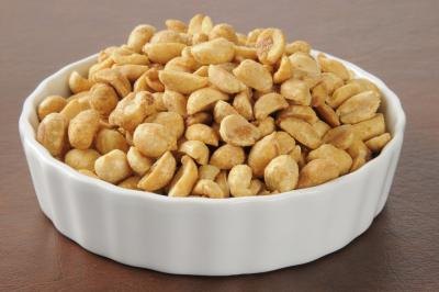 A bowl of roasted peanuts.