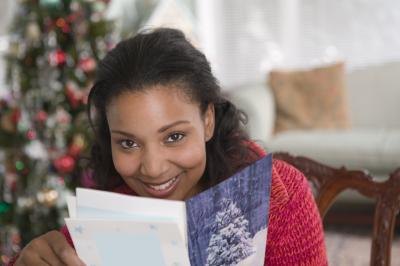 Give a gift card inside a Christmas greeting card picked just for her.