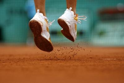 Shoe Goo is made to repair tennis shoes.