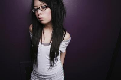 Young woman with long hair extensions.