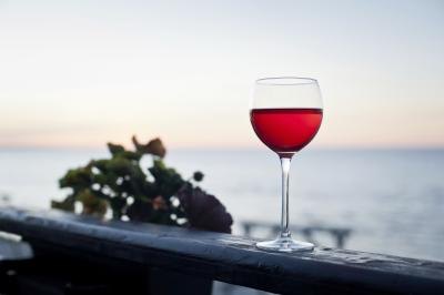 A small glass of red wine before bed may help you sleep.