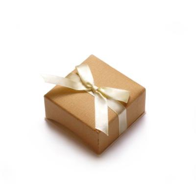Plain gift with white ribbon.