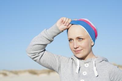 Woman without hair due to chemotherapy.