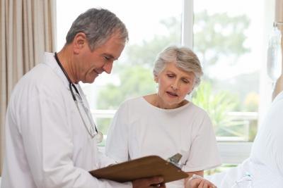 Mature woman talks to doctor