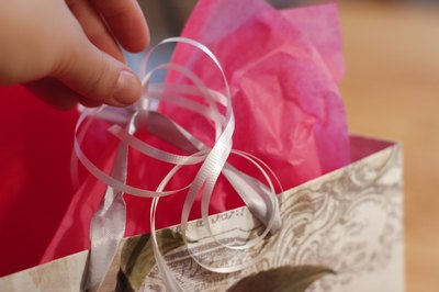 How to Put Tissue Paper in a Gift Bag (with Pictures) | eHow