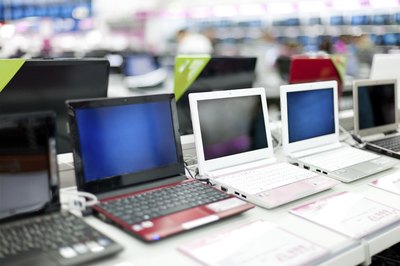 Laptops on display in store
