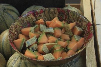 Pieces of cantaloupe for sale at a market in France.