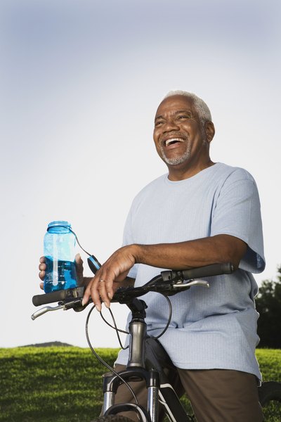 Elderly man drinking water