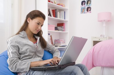 Teenage girl on laptop