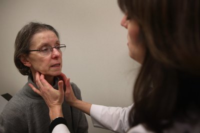 Doctor examining patient