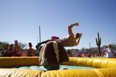 Use a mechanical bull to create a rodeo theme for your fall party.