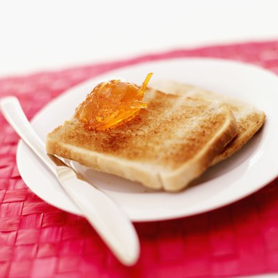 Two pieces of toast on a plate.