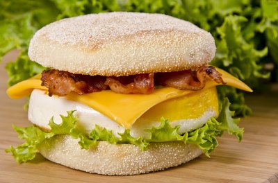 Breakfast sandwich on table.