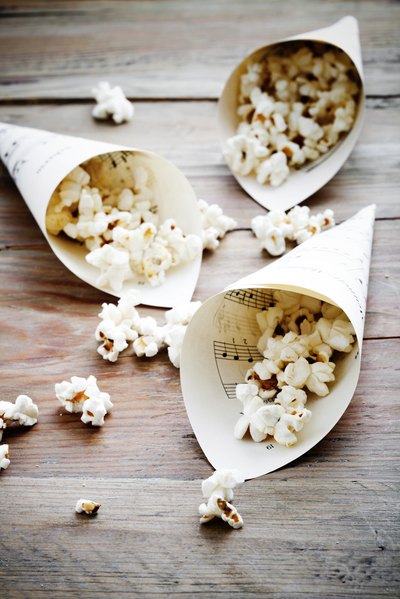 A potential complication occurs when a bit of food, such as candy or a popcorn kernel, becomes jammed between a dental crown and existing teeth.