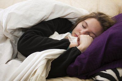Woman resting with cold