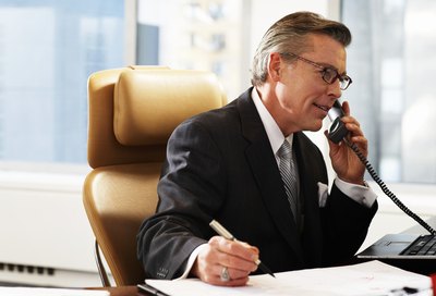 A businessman is on the phone.
