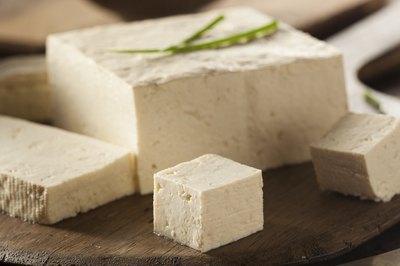 Organic tofu on cutting board.
