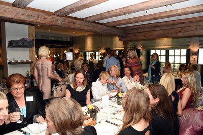 Women networking at a luncheon.