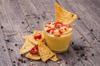 Cheddar cheese sauce pairs well with tomatoes and smoky flavor.