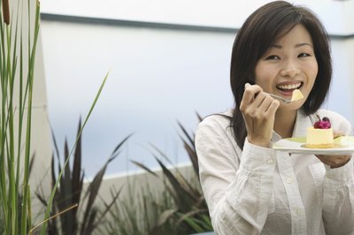 business woman sampling pie