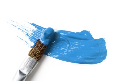Paintbrush with oil paint.