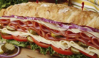 An overstuffed ham and cheese submarine sandwich