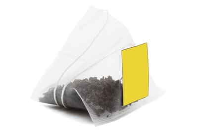 Close up of black teabag.
