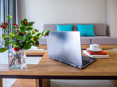 A modern living space with a sleek wooden desk.