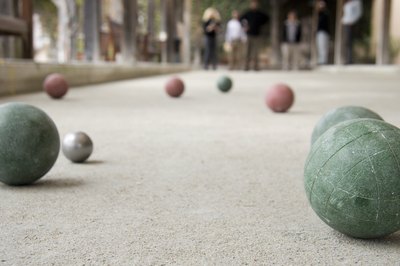 Bocci balls on a field.
